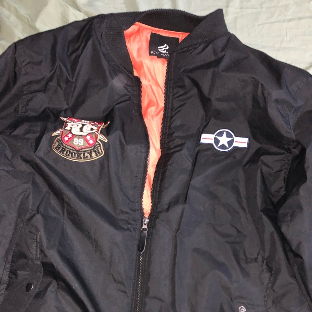 A bomber Rocawear jacket, barely worn and still freshly new